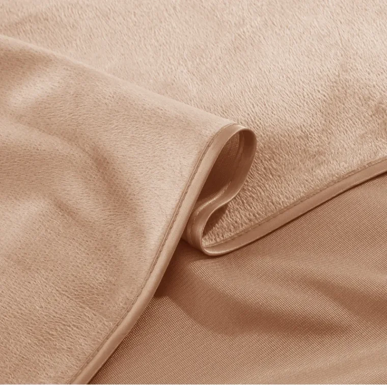 Embroidered fabric sample showcasing delicate craftsmanship.