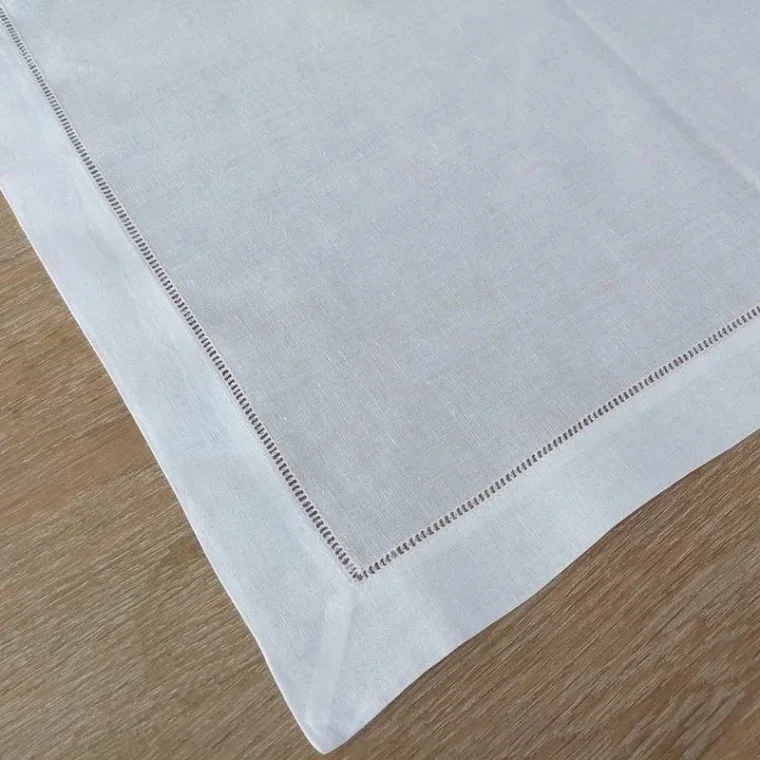 Embroidered silk fabric with floral motifs.