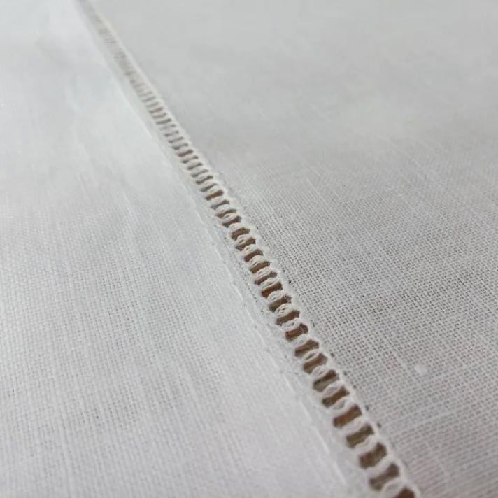 Embroidered silk fabric with floral motifs.