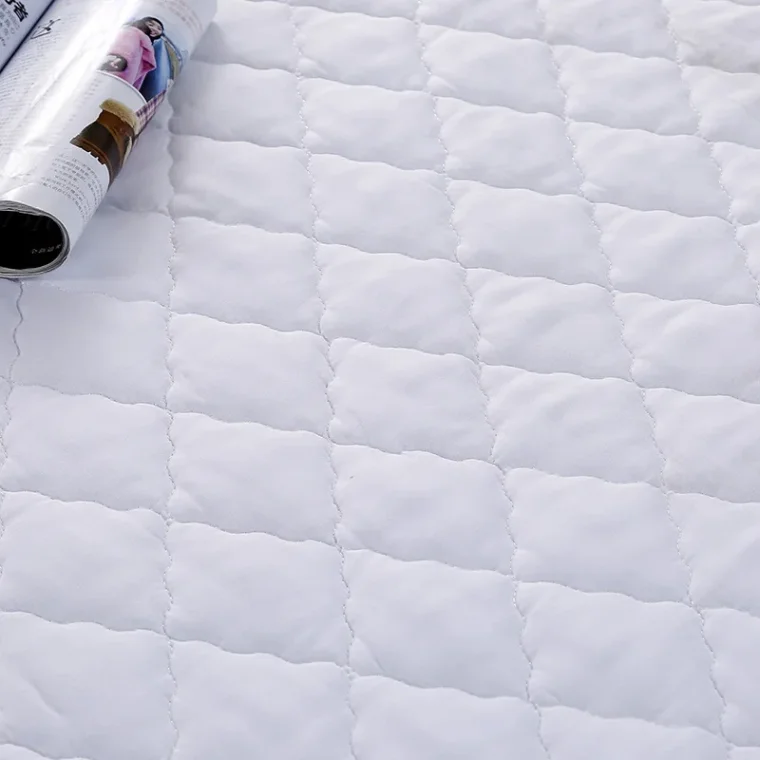 Beautifully embroidered fabric sample showcasing intricate craftsmanship.