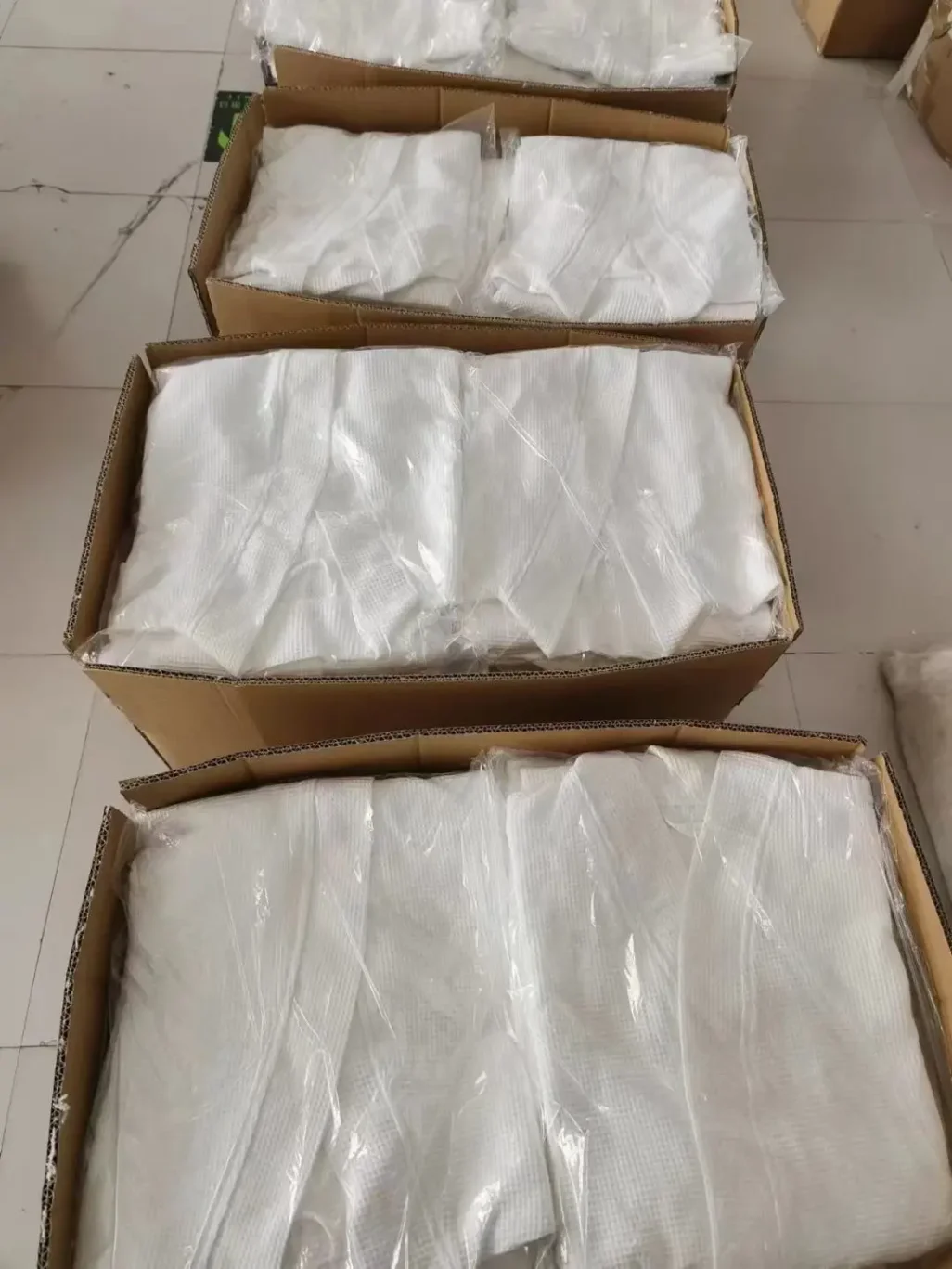 Collection of silk fabrics in various shades.
