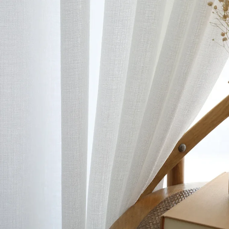 Embroidered fabric sample showcasing delicate craftsmanship.