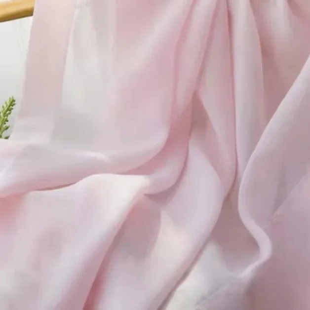 Embroidered silk fabric with floral motifs.