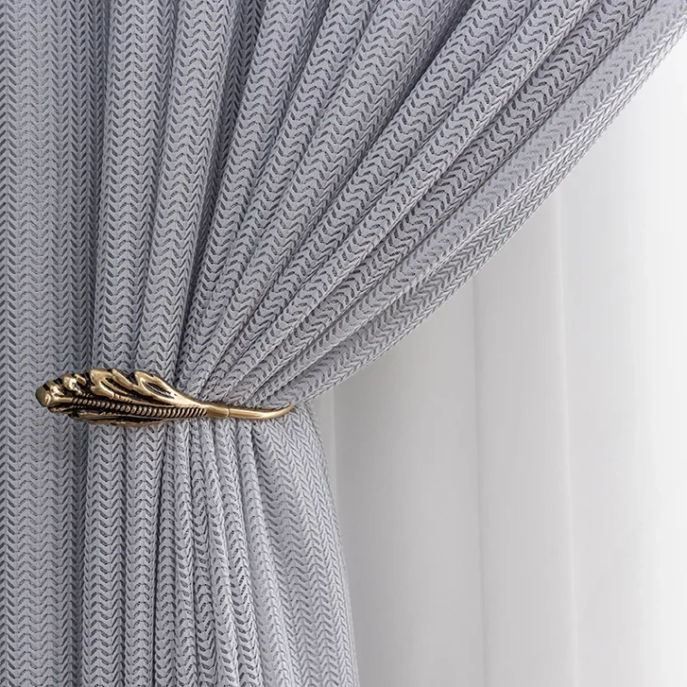 Luxurious silk fabric with smooth and shiny surface.