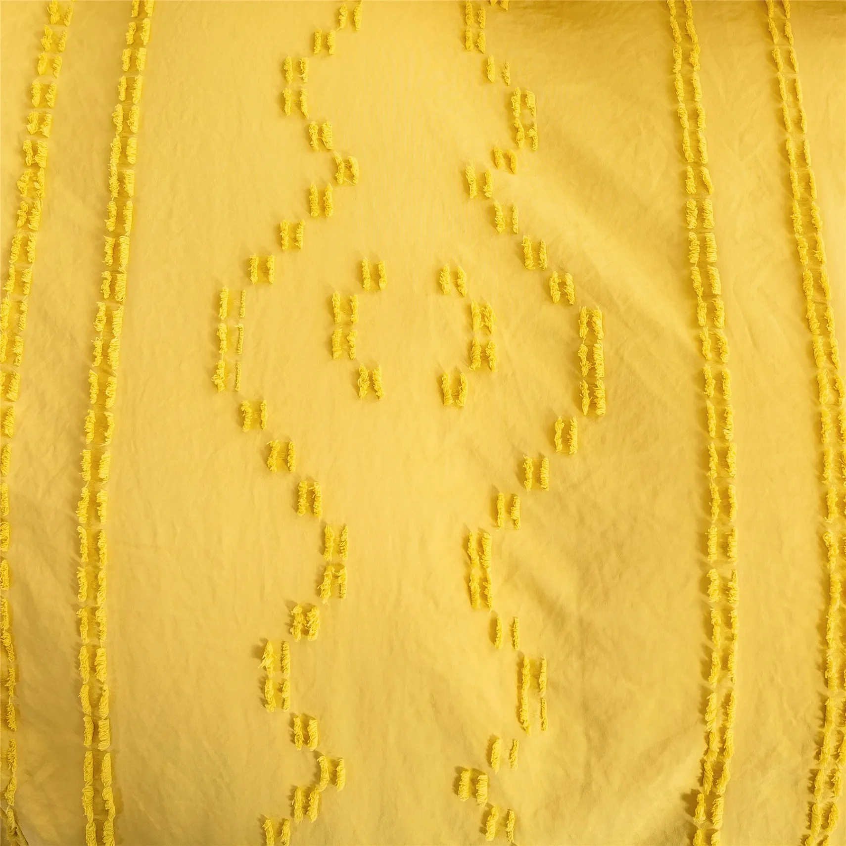 Luxurious silk fabric with a smooth and shiny finish.