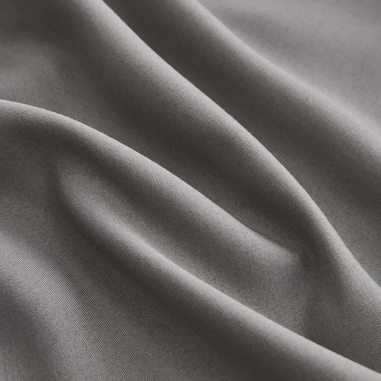 Smooth and shiny silk fabric texture.