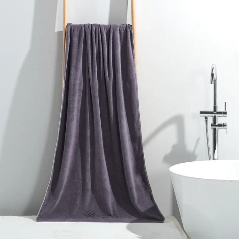 Natural cotton textile with visible weave pattern.