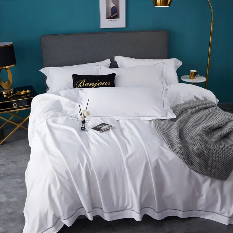Soft knitted blanket in neutral tones.